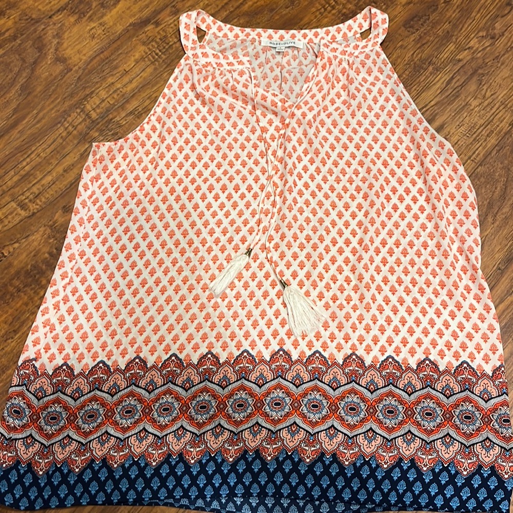 Love this shirt! Just doesn’t fit. Worn a few times.